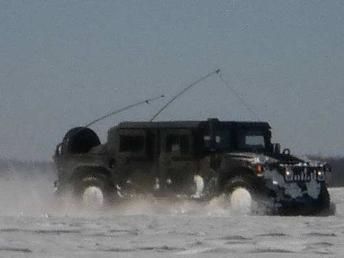 National Guard vehicle driving through the snow