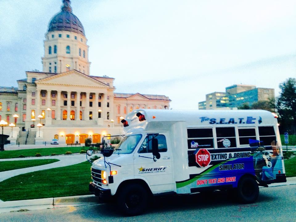 The S.E.A.T. bus outside the capitol building