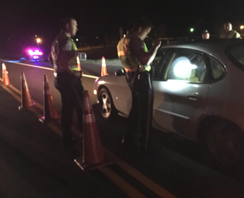 2 officers conducting sobriety checkpoint