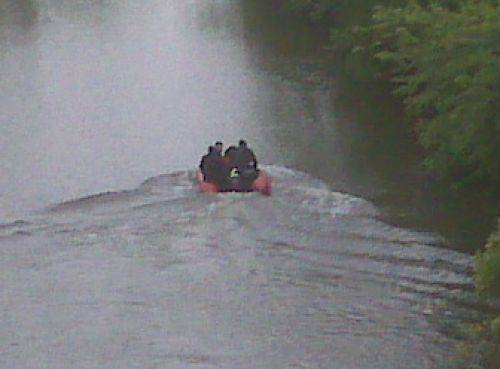 Newton County Rescue and Recovery team on raft in the water
