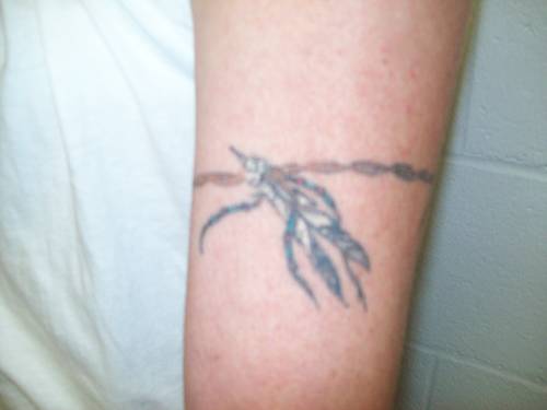 Tattoo on Sluder's right arm