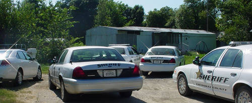 four police vehicles at scene of Tuesday's search warrant
